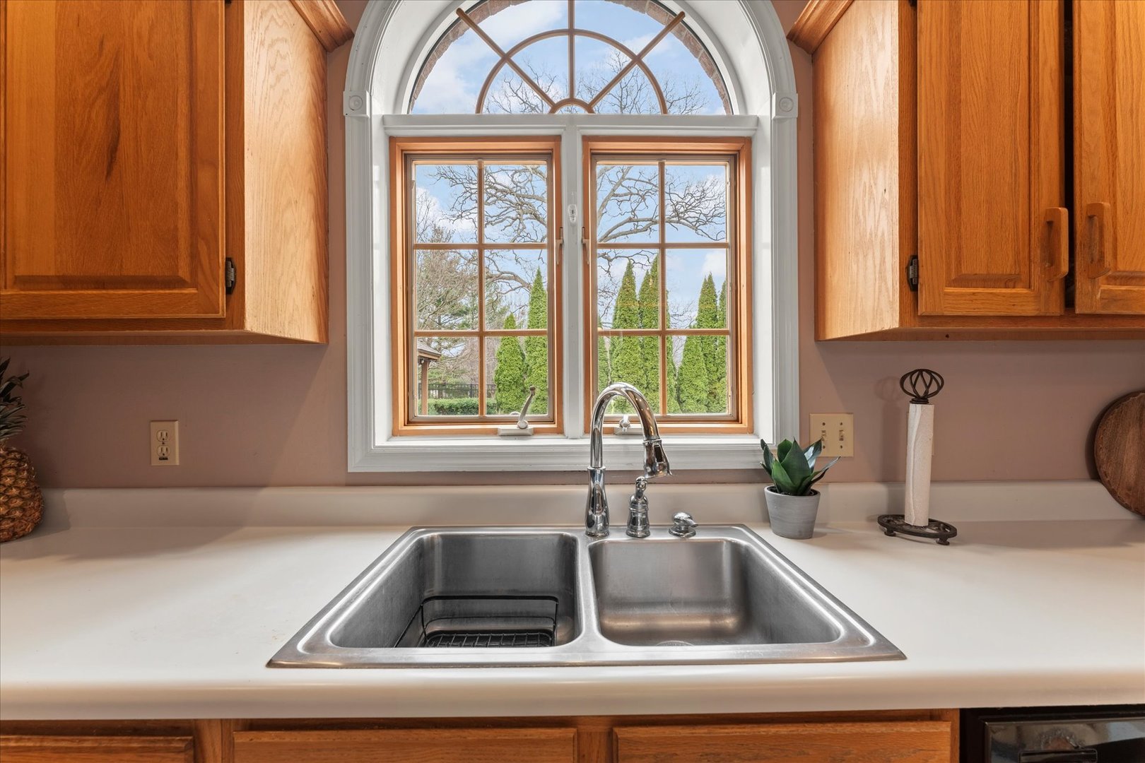1303 Hickory Tree Court Mahomet, IL 61853 - Photo 17 of 63 a kitchen with a sink and a window