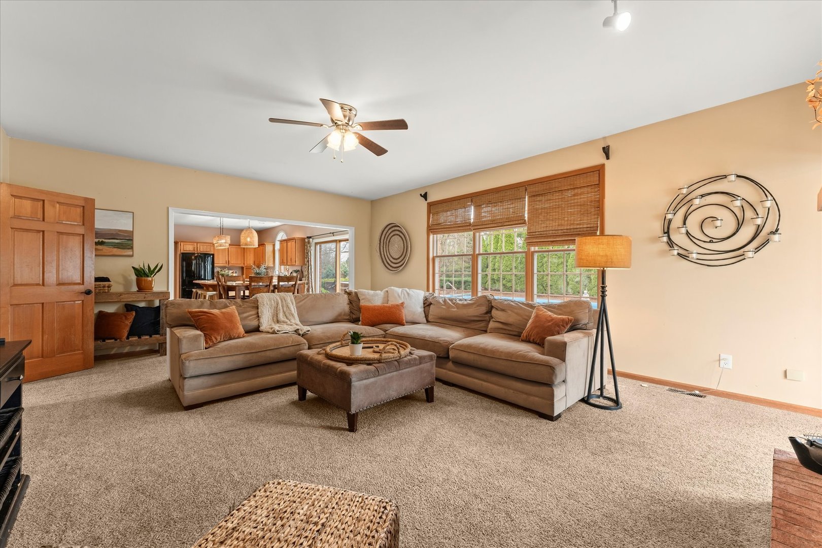 1303 Hickory Tree Court Mahomet, IL 61853 - Photo 27 of 63 a living room with furniture and a large window