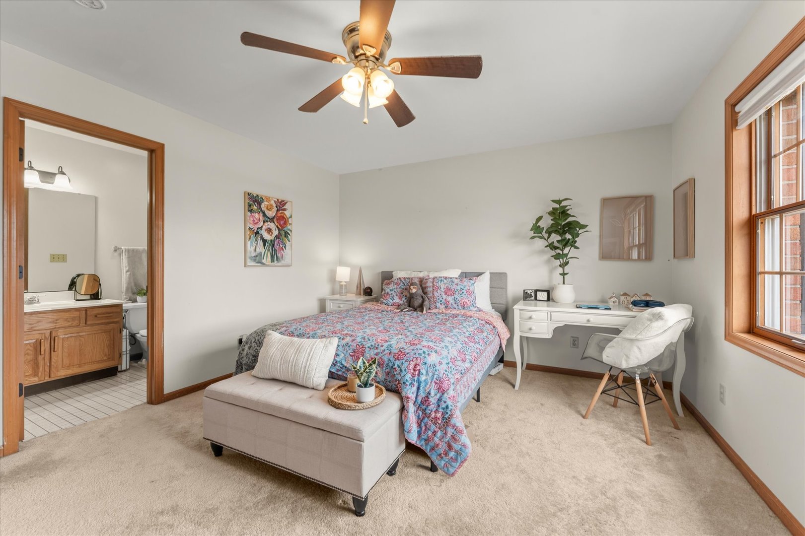 1303 Hickory Tree Court Mahomet, IL 61853 - Photo 36 of 63 a spacious bedroom with a bed and a chandelier
