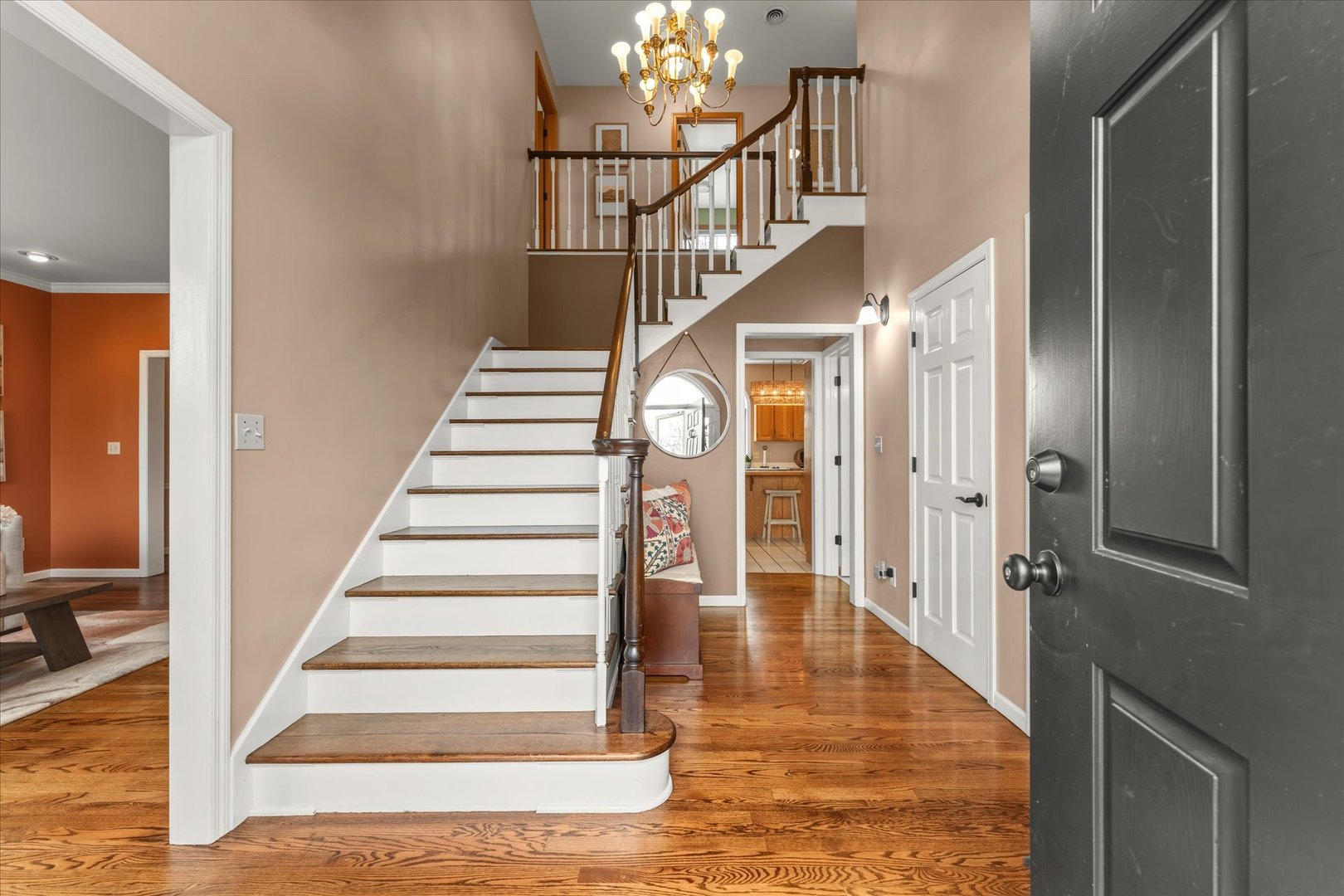 1303 Hickory Tree Court Mahomet, IL 61853 - Photo 5 of 63 a view of entryway and hall with wooden floor