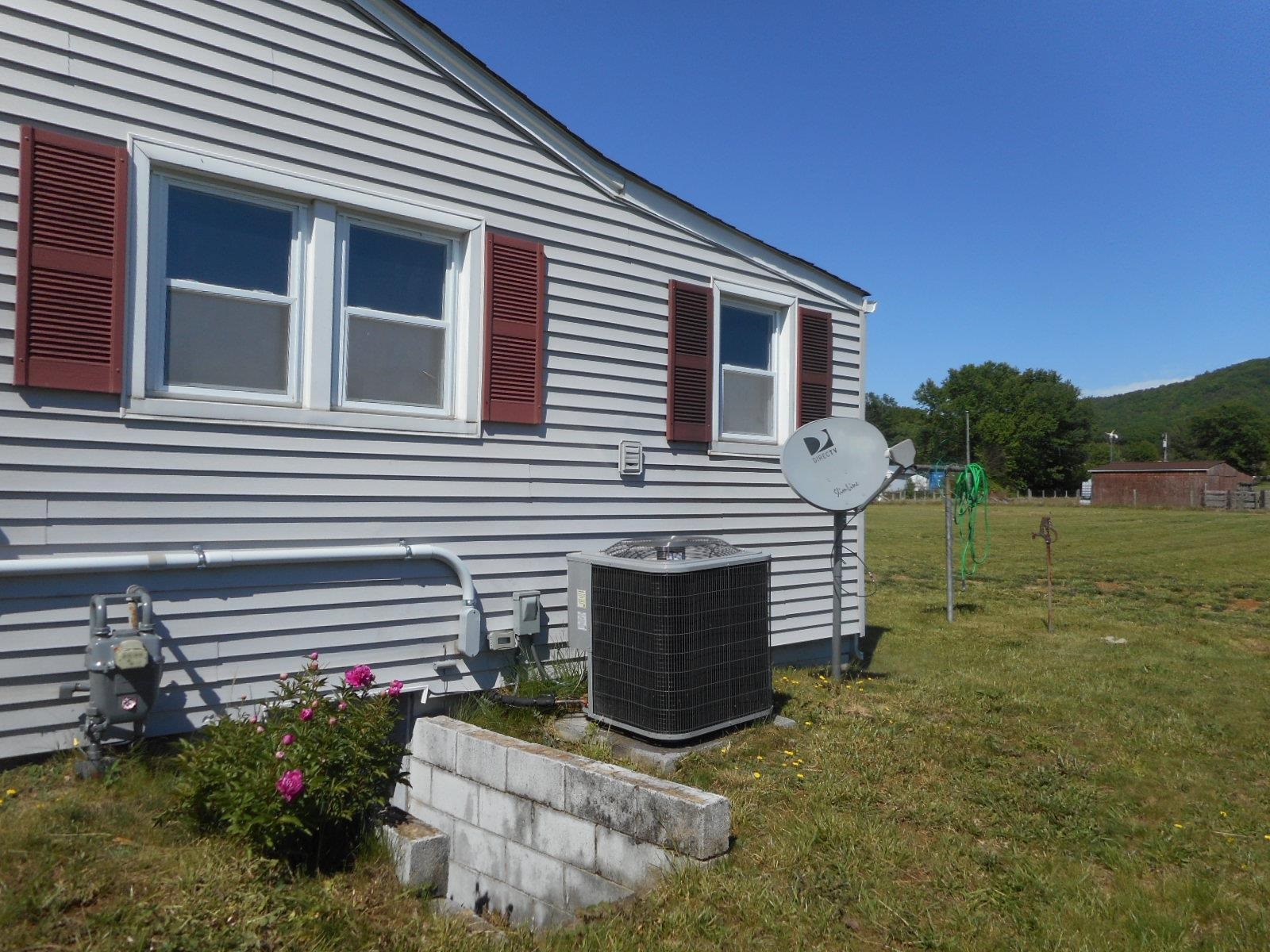 18874 Huckleberry Road Elkton, VA 22827 - Photo 3 of 23 a view of a house with a yard