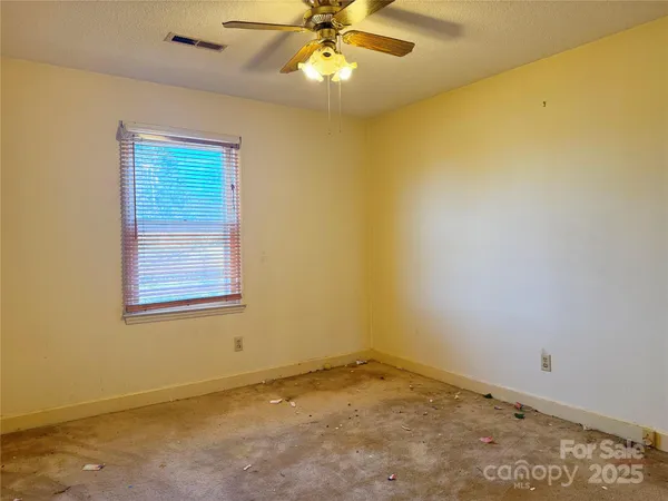 a bathroom with a shower and a mirror