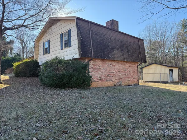 a house view with a backyard space