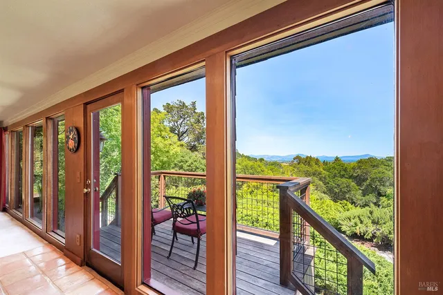 a living room with furniture and a gate