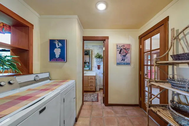 a kitchen with a stove and a refrigerator