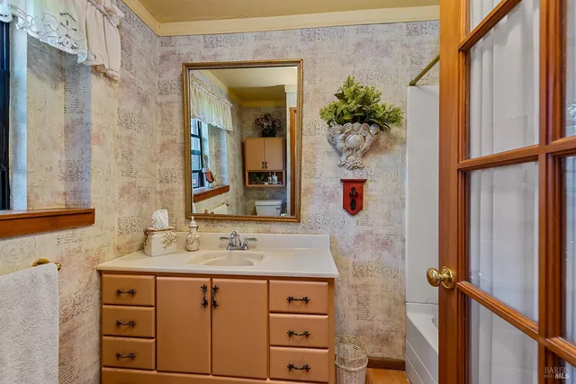 a dining room with furniture window and outside view