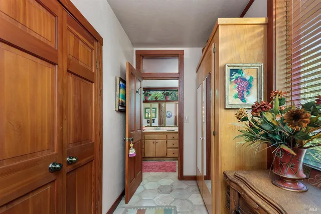 a kitchen with stainless steel appliances granite countertop a stove and a cabinets