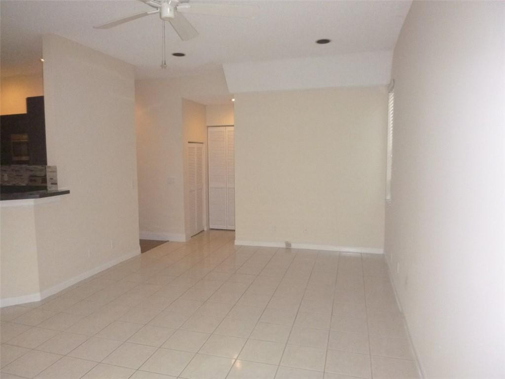 745 Falling Water Road Weston, FL 33326 - Photo 11 of 34 a view of an empty room with a window