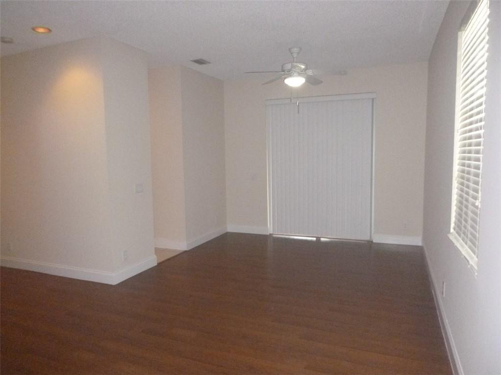 745 Falling Water Road Weston, FL 33326 - Photo 12 of 34 a view of an empty room and window