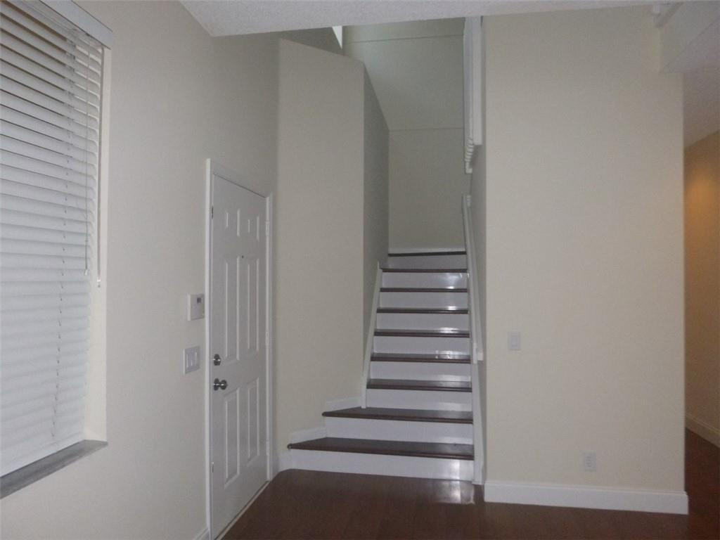 745 Falling Water Road Weston, FL 33326 - Photo 13 of 34 a view of entryway with stairs