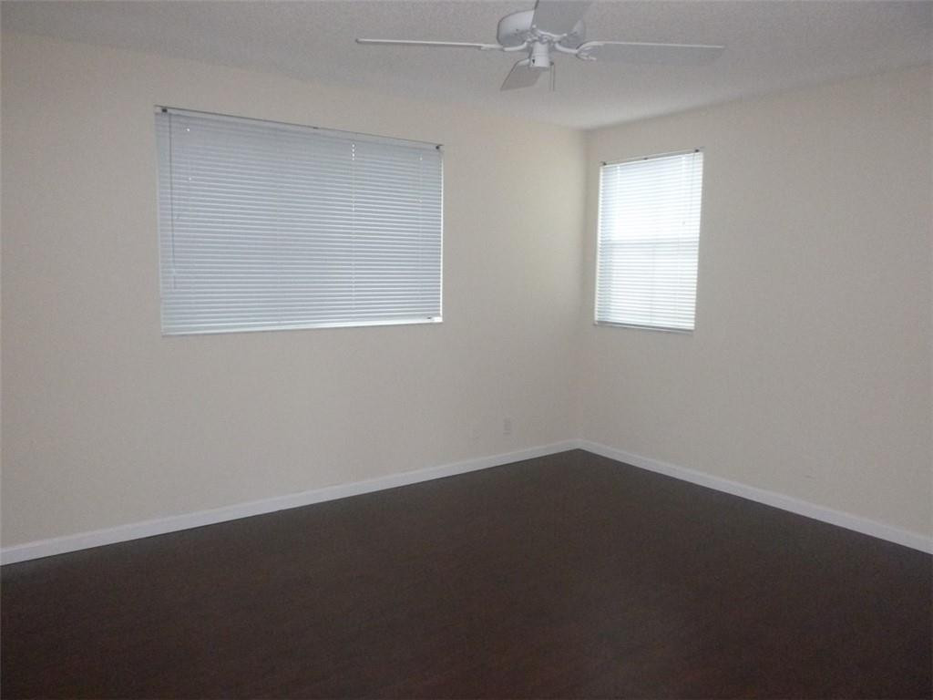 745 Falling Water Road Weston, FL 33326 - Photo 22 of 34 an empty room with a window