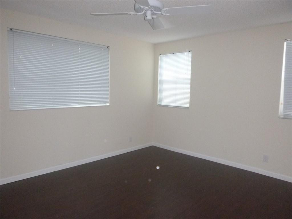 745 Falling Water Road Weston, FL 33326 - Photo 25 of 34 an empty room with a window