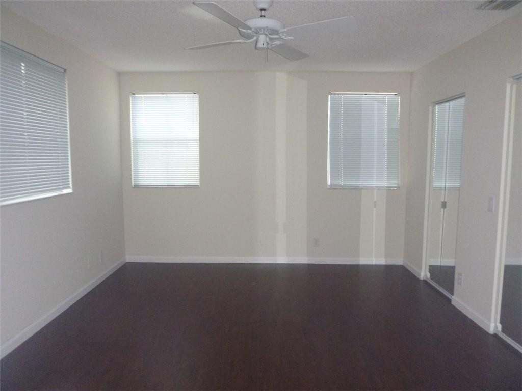 745 Falling Water Road Weston, FL 33326 - Photo 26 of 34 an empty room with a window