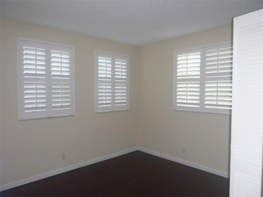 745 Falling Water Road Weston, FL 33326 - Photo 27 of 34 an empty room with a window