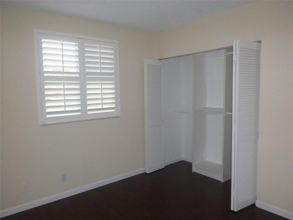 745 Falling Water Road Weston, FL 33326 - Photo 28 of 34 a view of an empty room with a window