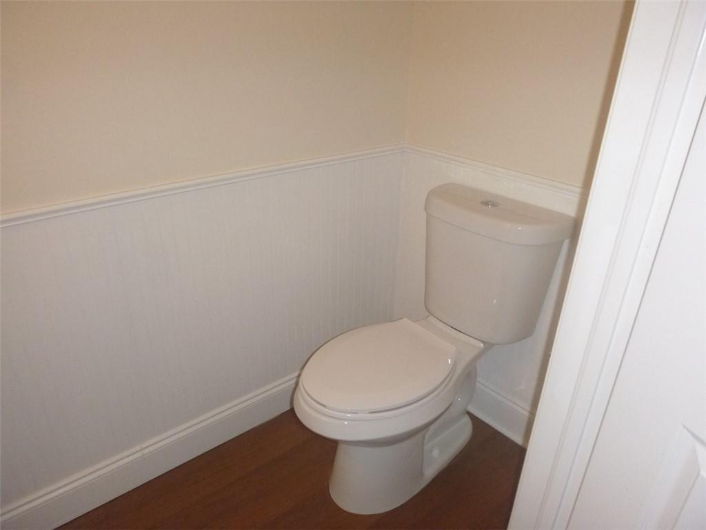 745 Falling Water Road Weston, FL 33326 - Photo 29 of 34 a white toilet sitting next to a shower