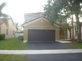 745 Falling Water Road Weston, FL 33326 - Photo 3 of 34 a view of backyard of house