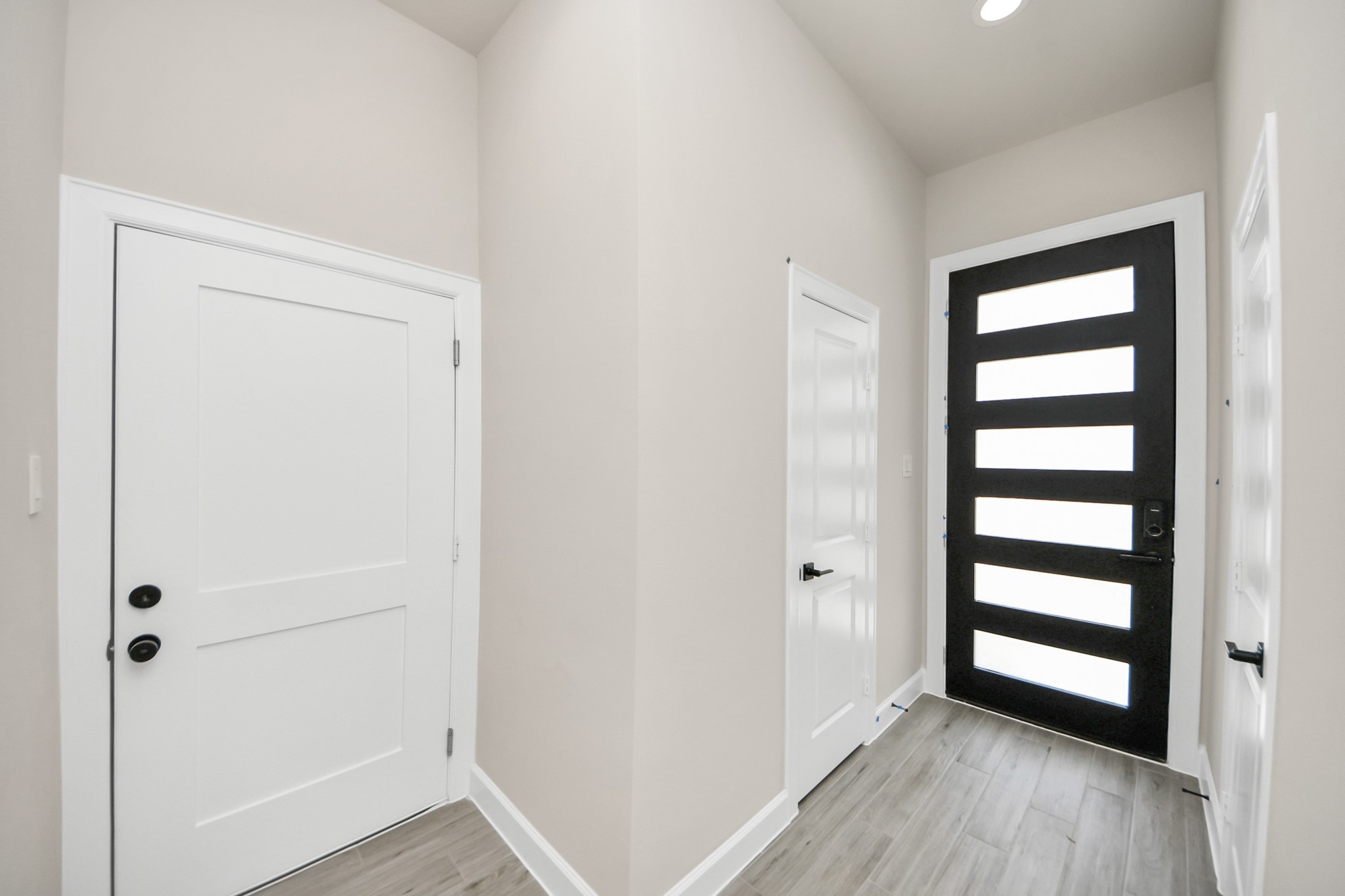 3110 Dawson Lane, Unit A Houston, TX 77051 - Photo 4 of 32 a view of empty room with wooden floor