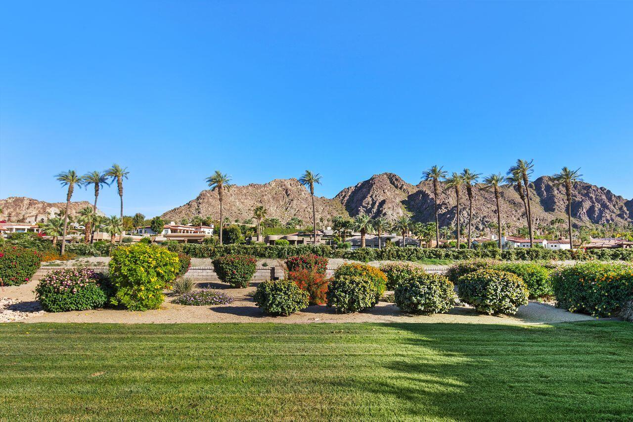 45250 Vista Santa Rosa Indian Wells, CA 92210 - Photo 11 of 28 a view of a large body of water with a building in the background