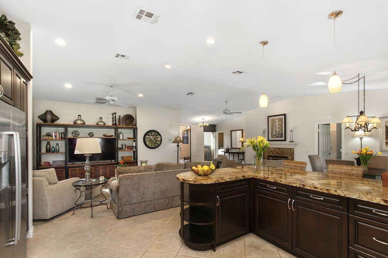 45250 Vista Santa Rosa Indian Wells, CA 92210 - Photo 21 of 28 a spacious bathroom with a double vanity sink and a mirror