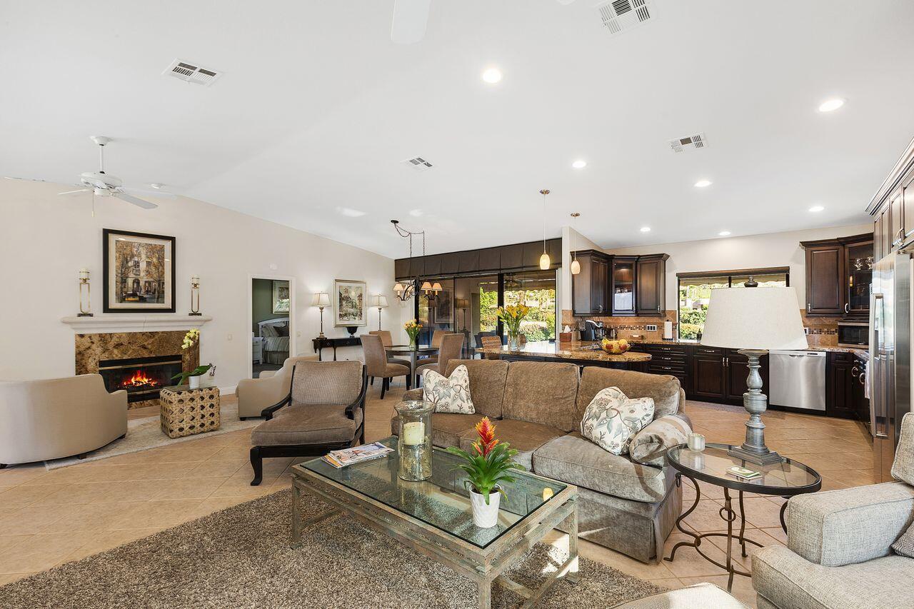 45250 Vista Santa Rosa Indian Wells, CA 92210 - Photo 4 of 28 a living room with furniture and kitchen view