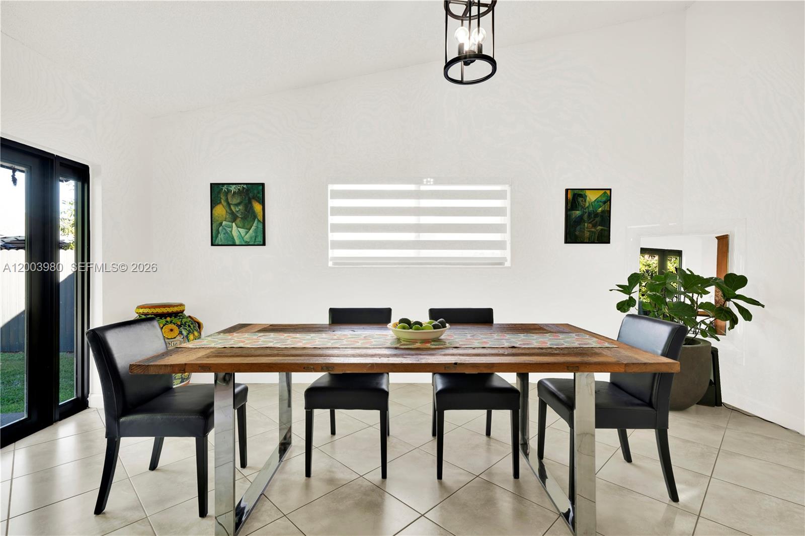 12221 Southwest 93rd Street Miami, FL 33186 - Photo 13 of 41 a view of a dining room with furniture and window