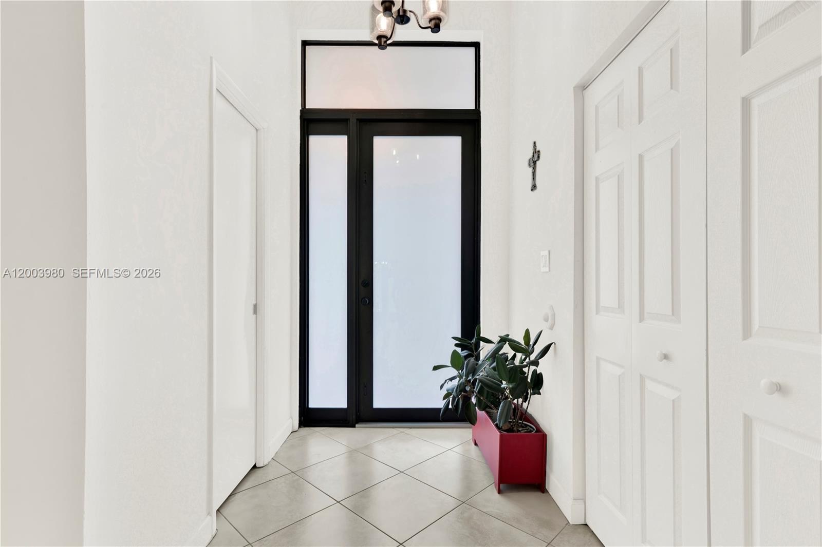12221 Southwest 93rd Street Miami, FL 33186 - Photo 16 of 41 a view of a hallway with front door