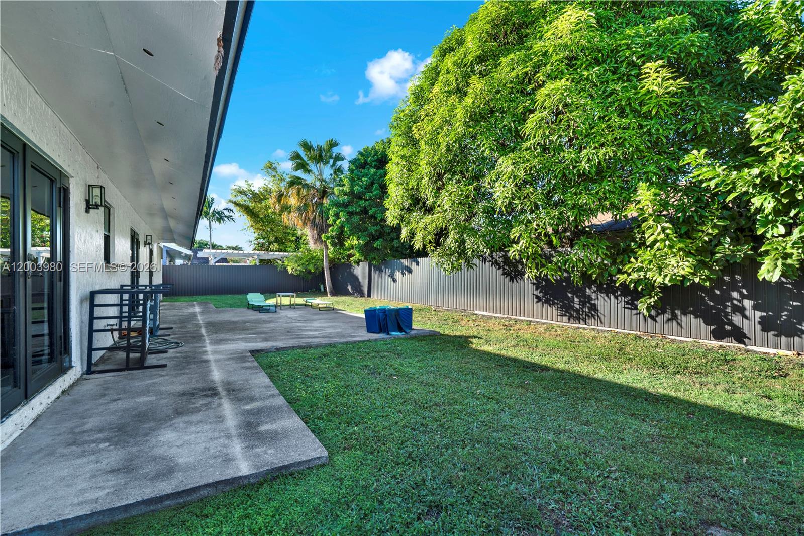 12221 Southwest 93rd Street Miami, FL 33186 - Photo 29 of 41 a view of a backyard with a garden