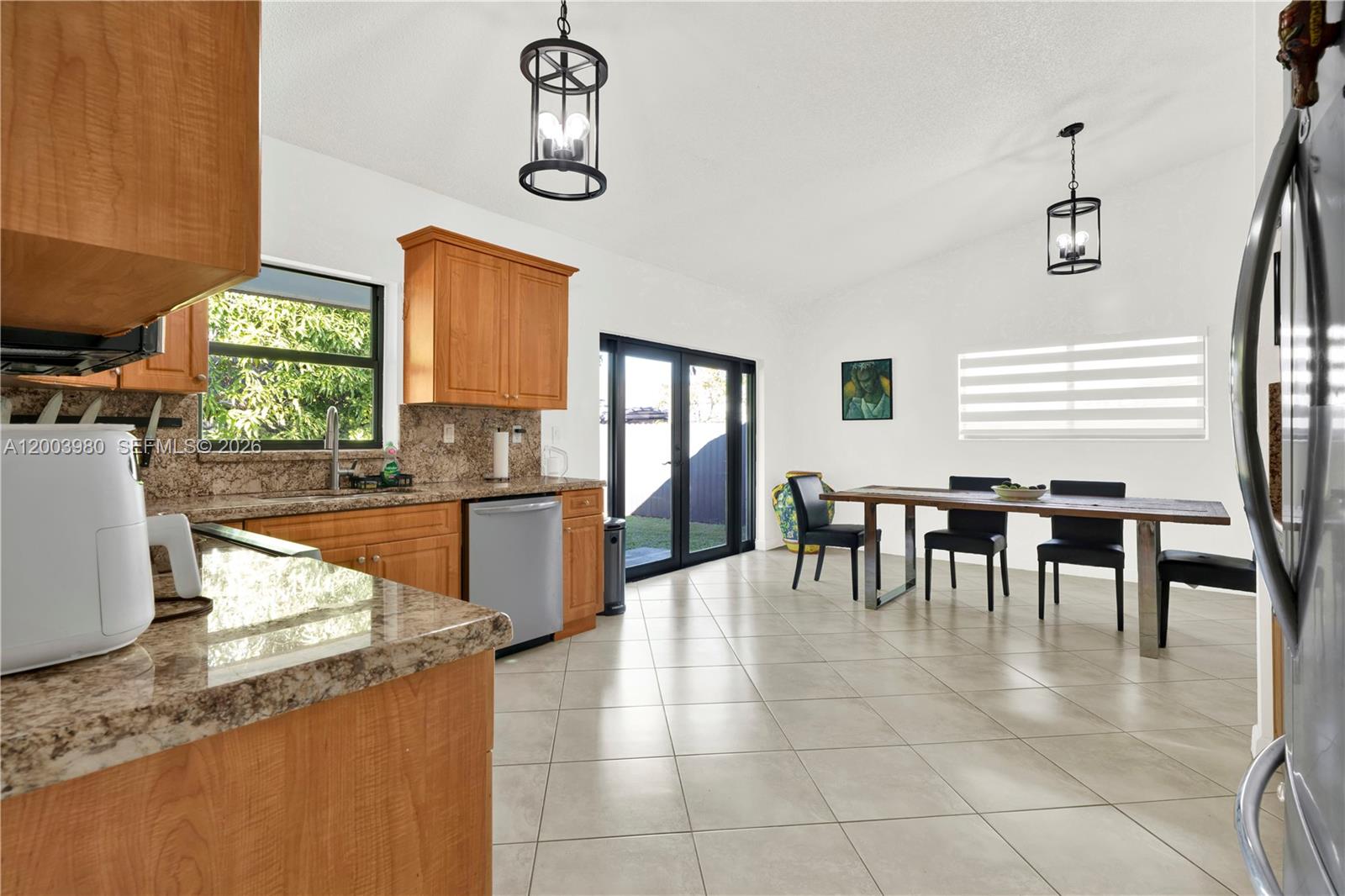 12221 Southwest 93rd Street Miami, FL 33186 - Photo 6 of 41 a lobby with furniture and window