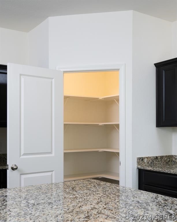 3527 Fernanda Drive Deltona, FL 32738 - Photo 6 of 9 a view of a room with a window and wooden floor