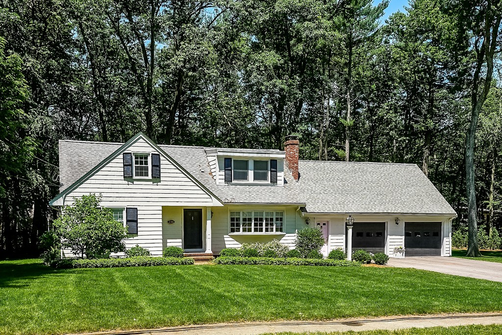 236 Hayward Mill Road Concord, MA 01742 - Photo 1 of 26 a house that has a tree in front of a white house