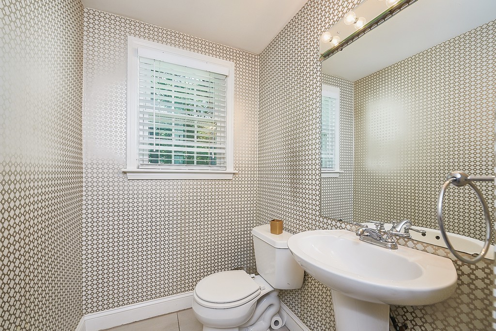 236 Hayward Mill Road Concord, MA 01742 - Photo 14 of 26 a bathroom with a sink a toilet and shower