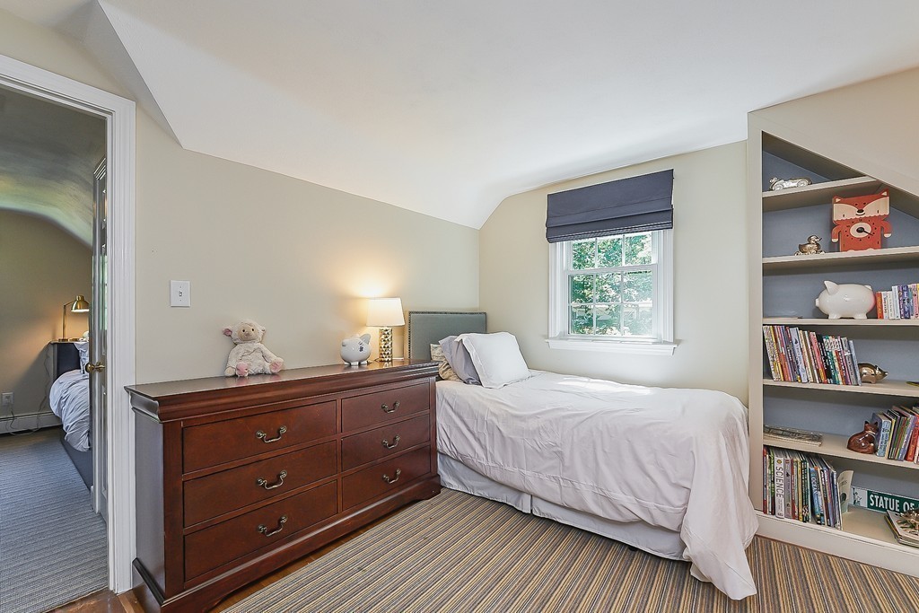 236 Hayward Mill Road Concord, MA 01742 - Photo 15 of 26 a bedroom with a bed and a dresser