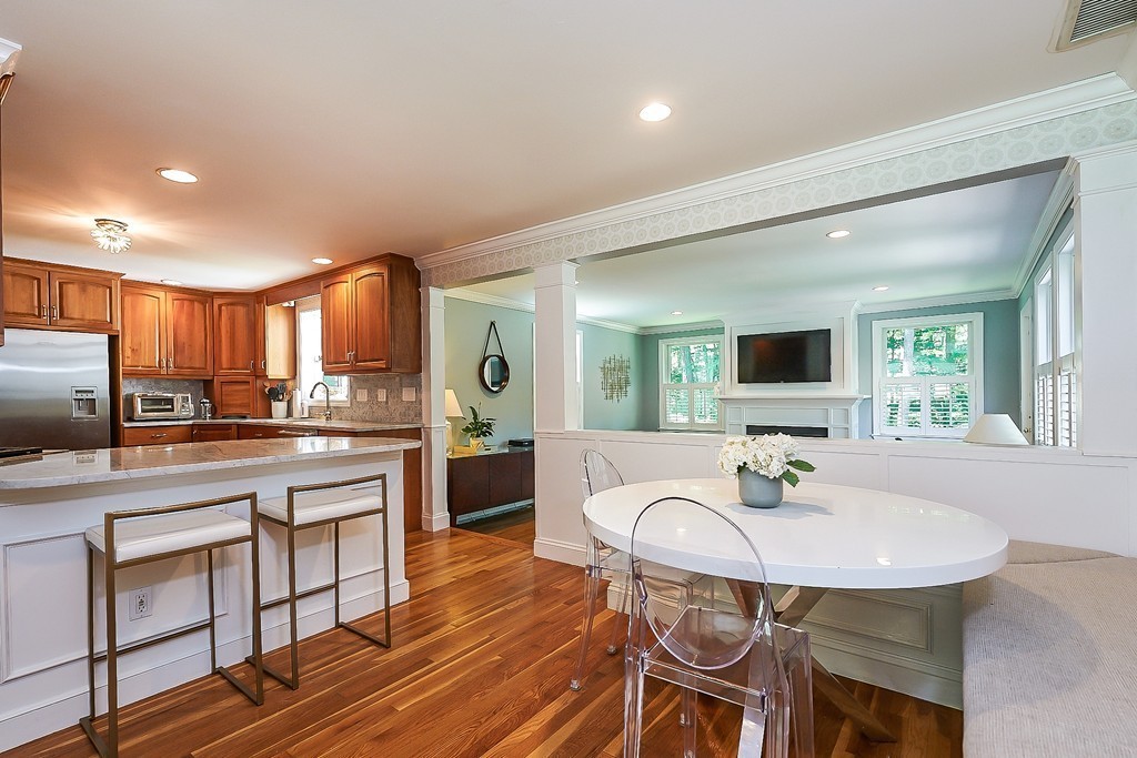 236 Hayward Mill Road Concord, MA 01742 - Photo 3 of 26 a kitchen with a table and chairs in it