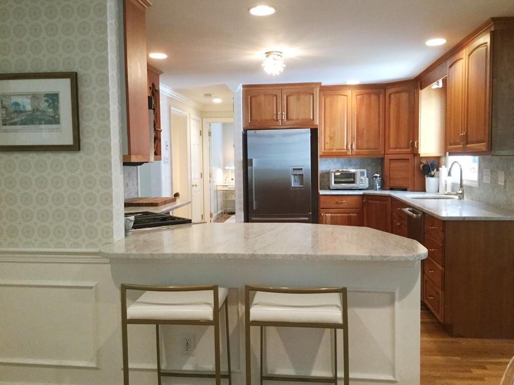 236 Hayward Mill Road Concord, MA 01742 - Photo 6 of 26 a kitchen with stainless steel appliances a sink stove and refrigerator