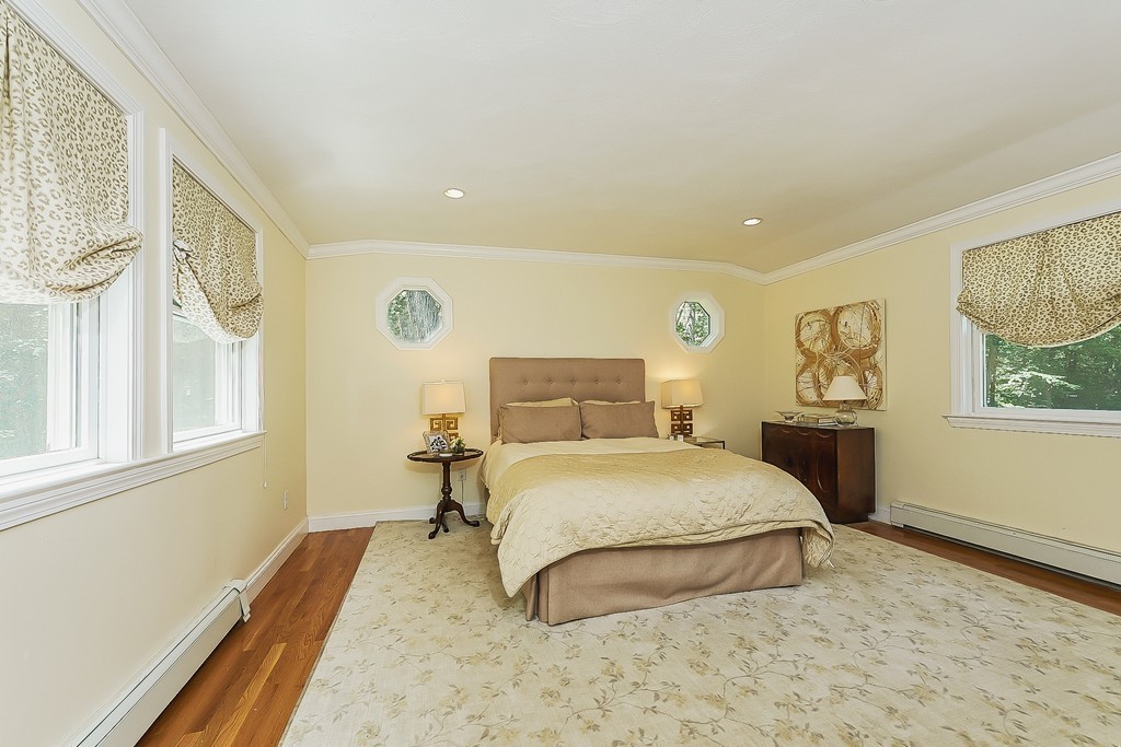 236 Hayward Mill Road Concord, MA 01742 - Photo 10 of 26 a bedroom with a bed and a window