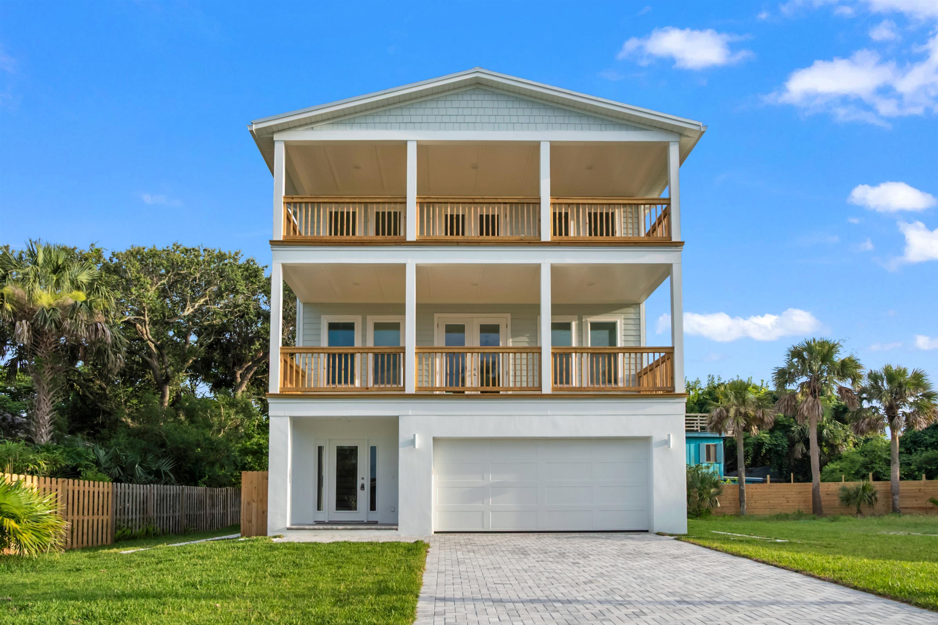 137 Ferrol Road St. Augustine, FL 32084 - Photo 17 of 55 a front view of a house with a yard