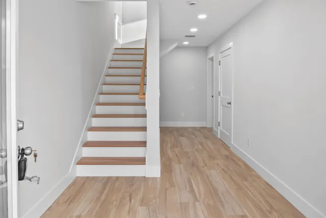 a view of a house with a yard and plants