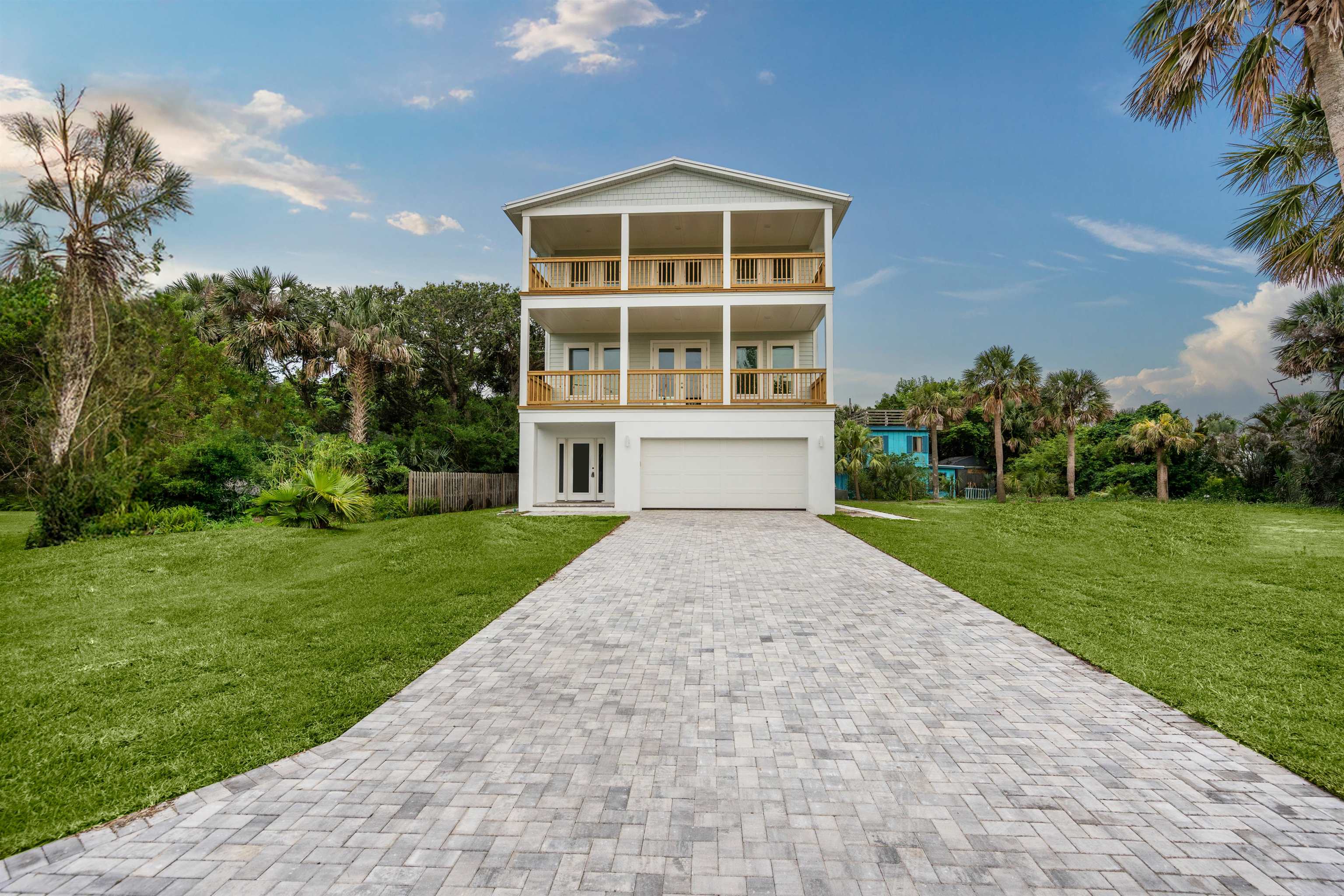 137 Ferrol Road St. Augustine, FL 32084 - Photo 2 of 55 a front view of a house with a yard