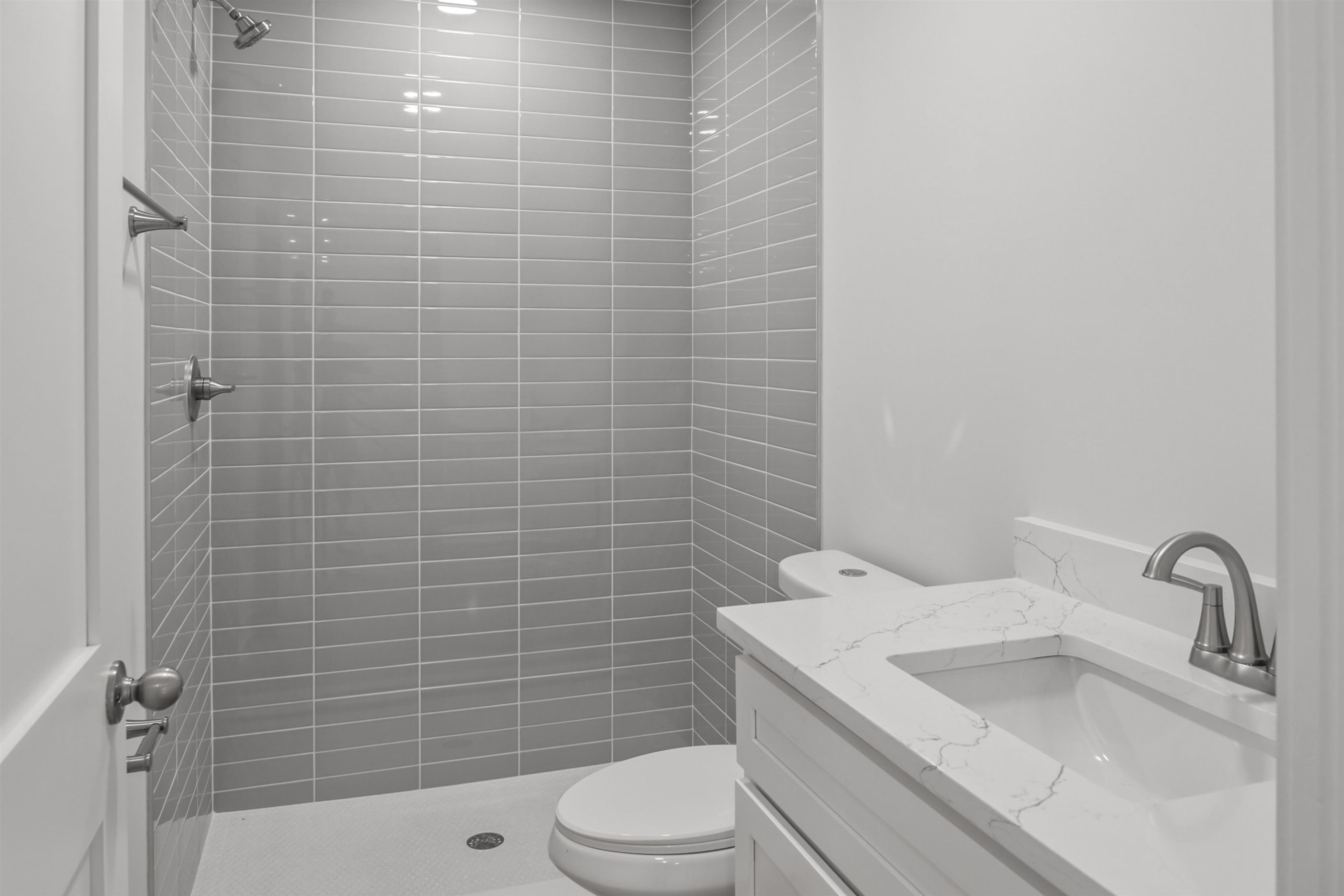 137 Ferrol Road St. Augustine, FL 32084 - Photo 24 of 55 a bathroom with a sink a toilet and shower