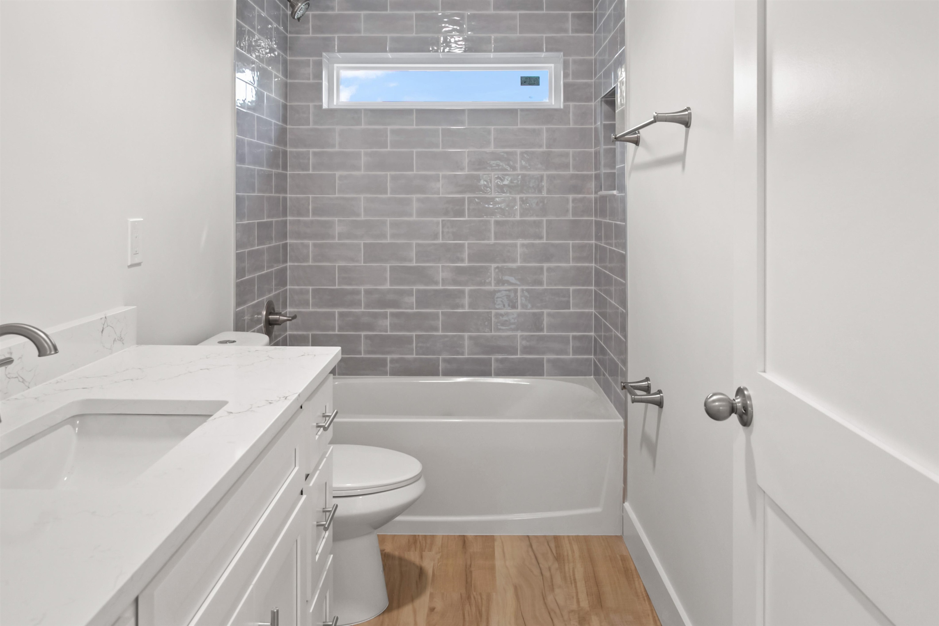 137 Ferrol Road St. Augustine, FL 32084 - Photo 35 of 55 a bathroom with a sink a toilet and shower