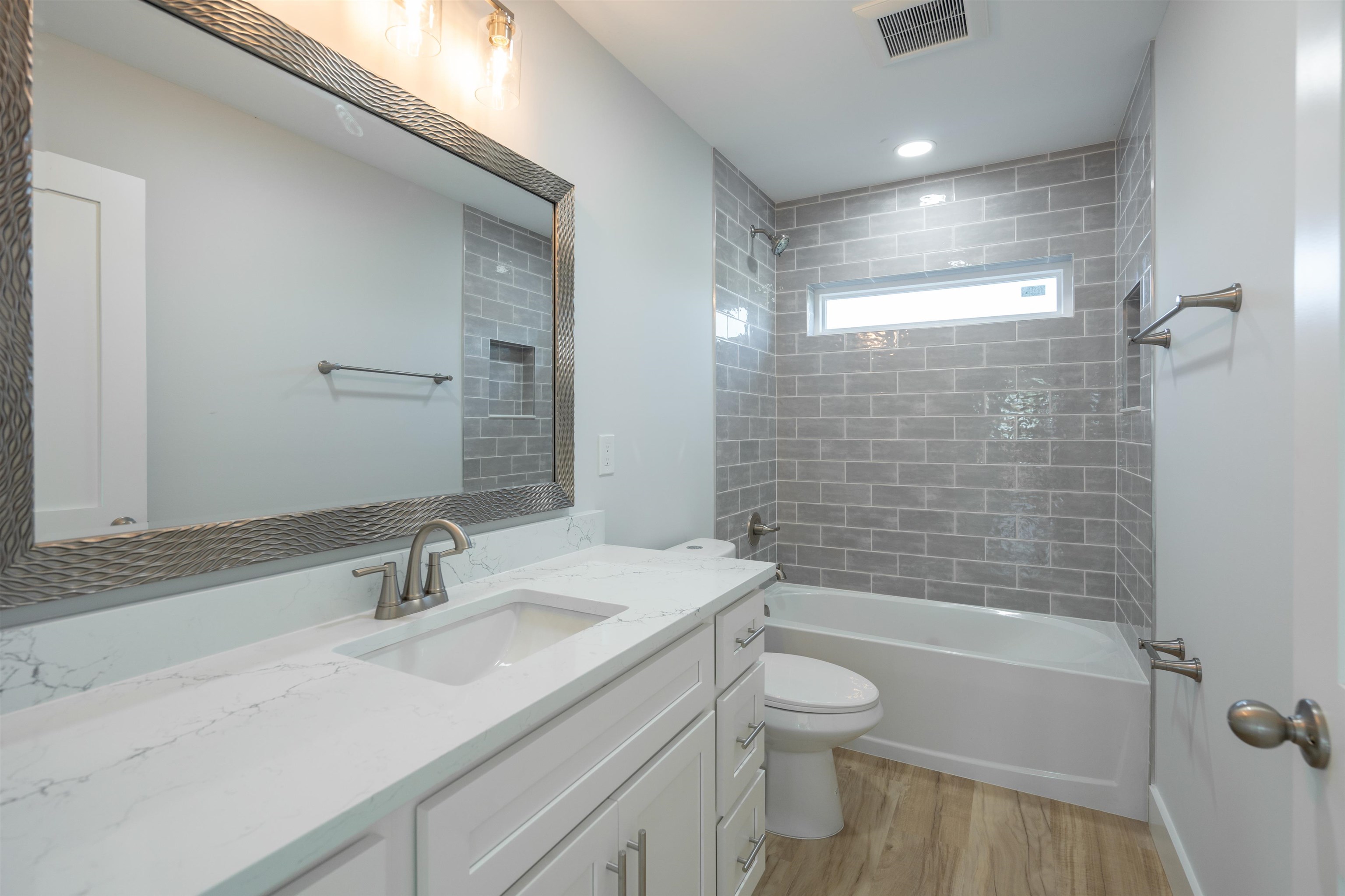 137 Ferrol Road St. Augustine, FL 32084 - Photo 54 of 55 a bathroom with a sink a toilet and shower