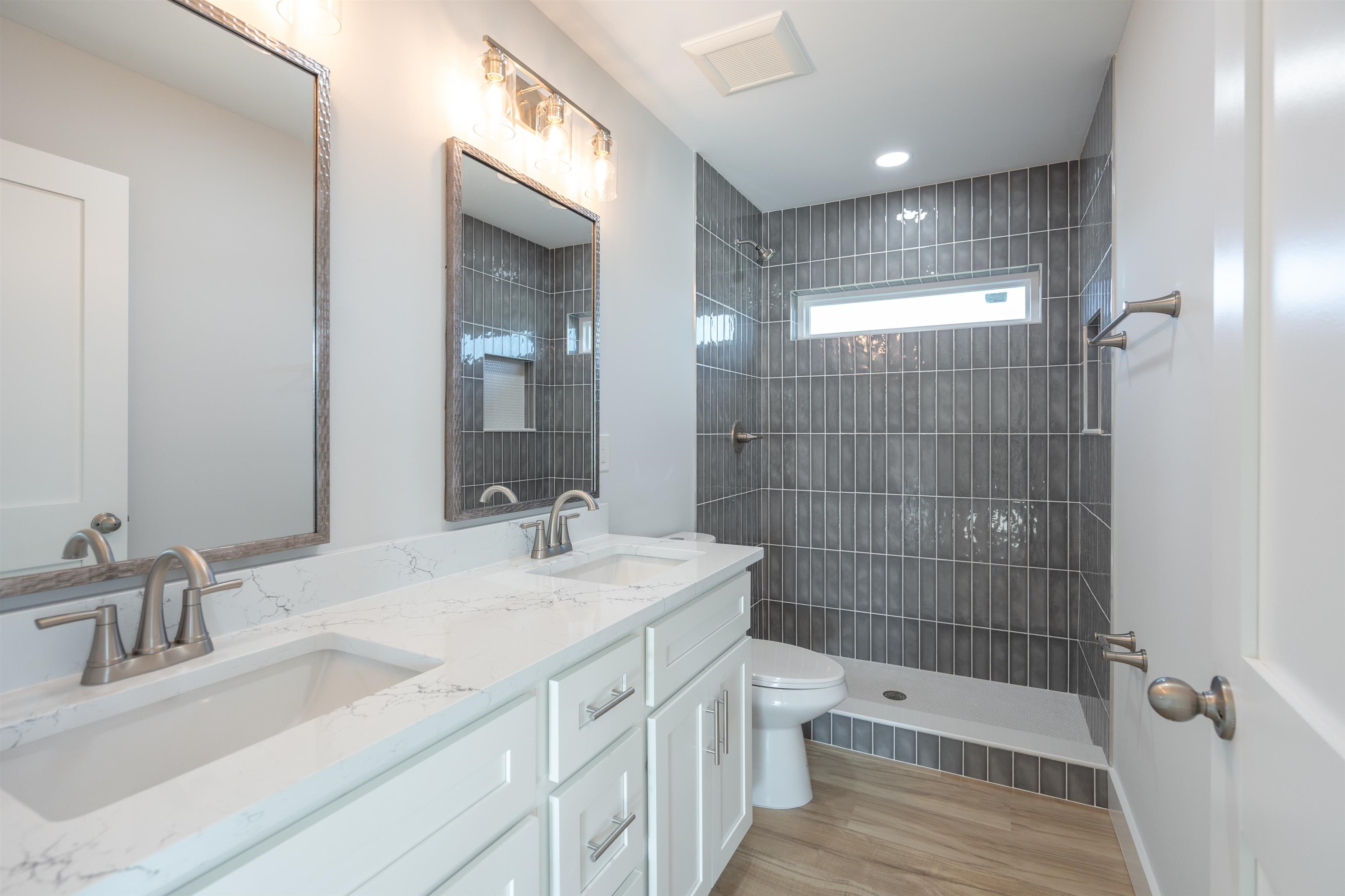 137 Ferrol Road St. Augustine, FL 32084 - Photo 55 of 55 a bathroom with a double vanity sink toilet and shower