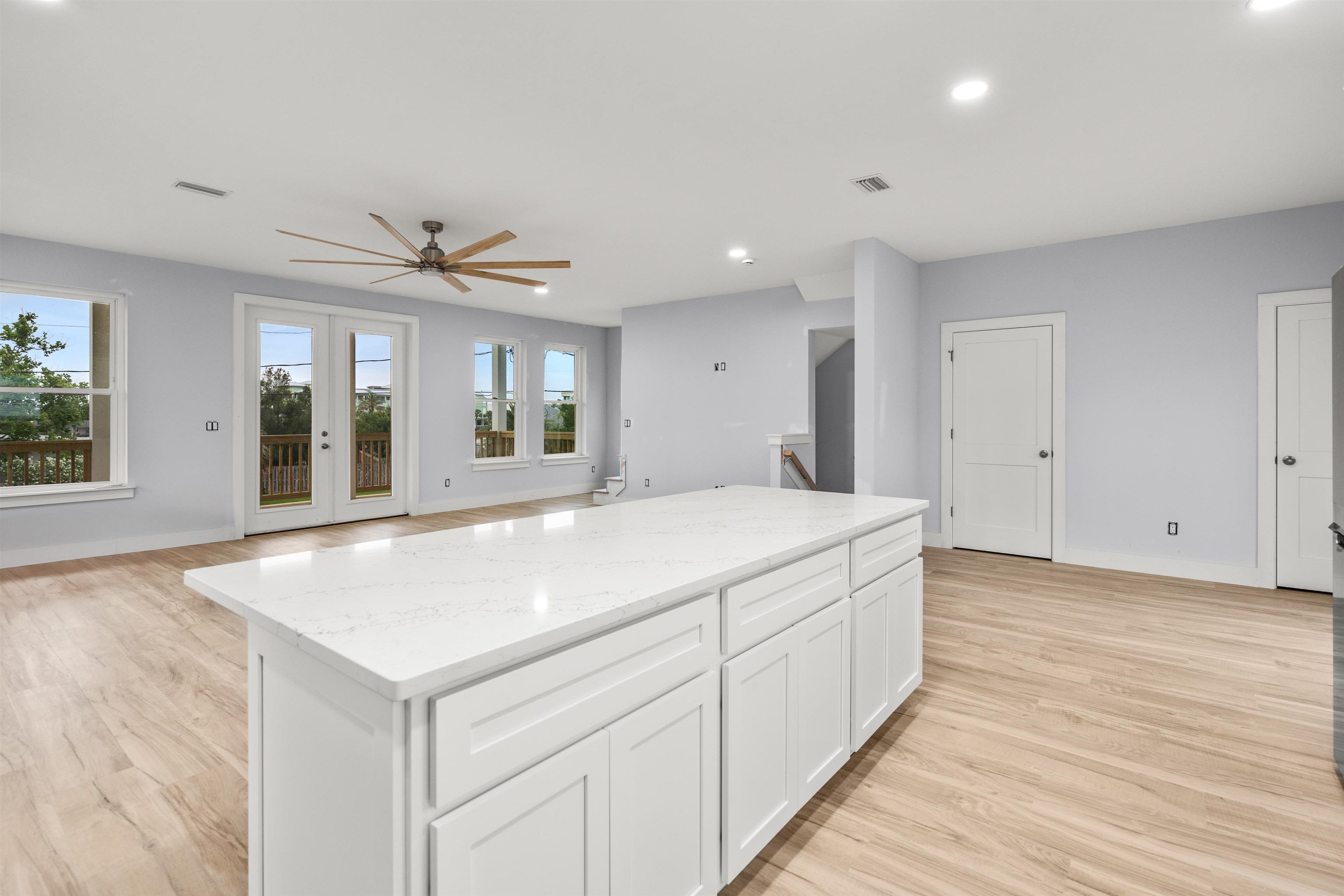 137 Ferrol Road St. Augustine, FL 32084 - Photo 6 of 55 a view of an empty room with wooden floor and a window