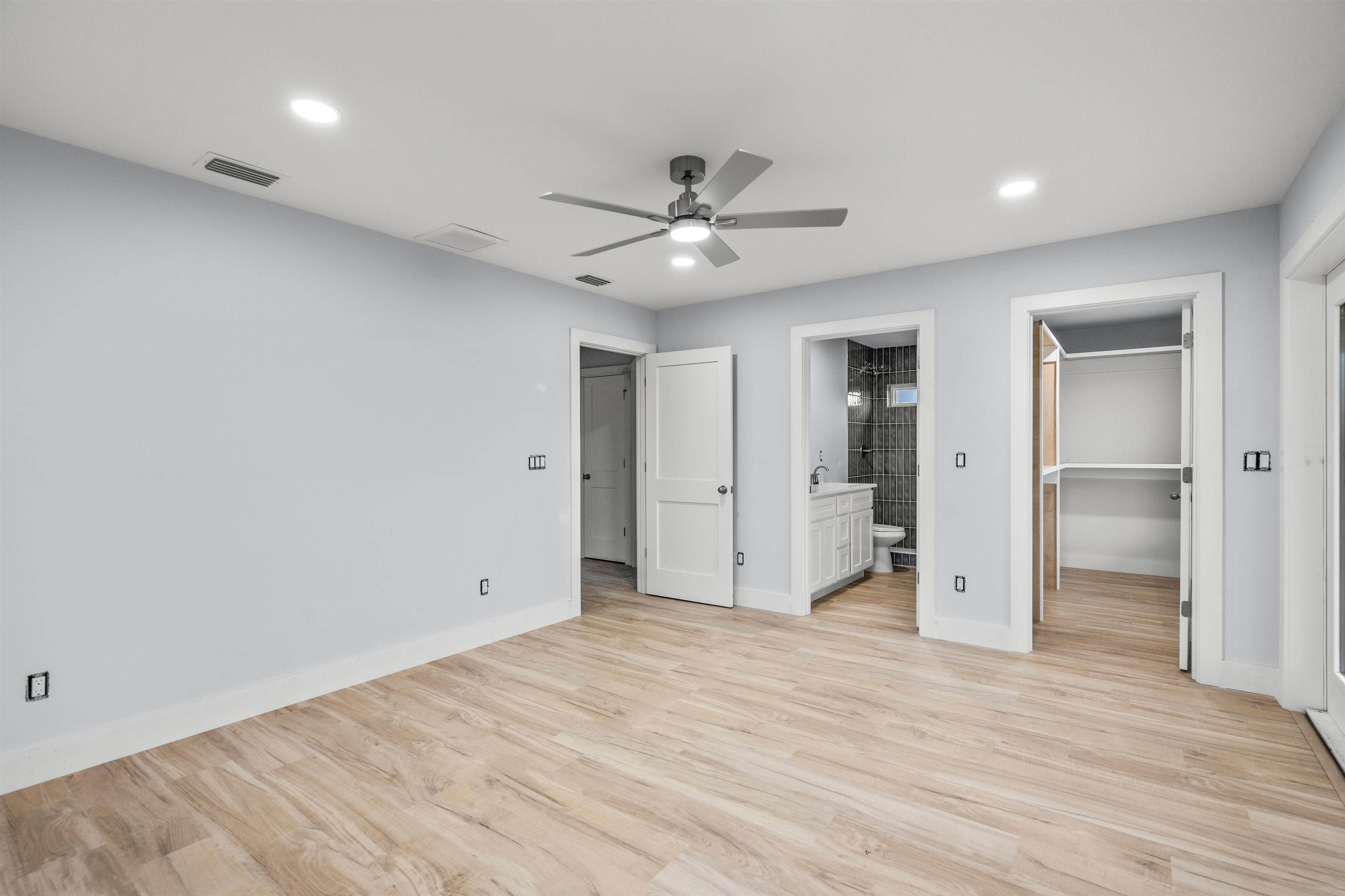 137 Ferrol Road St. Augustine, FL 32084 - Photo 8 of 55 an empty room with closet and a ceiling fan