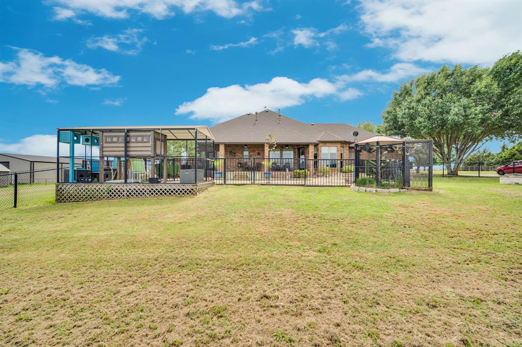 241 Cody Road Ennis, TX 75119 - Photo 34 of 40 Check out this amazing custom cat house and bird atrium! Could be used for other uses.