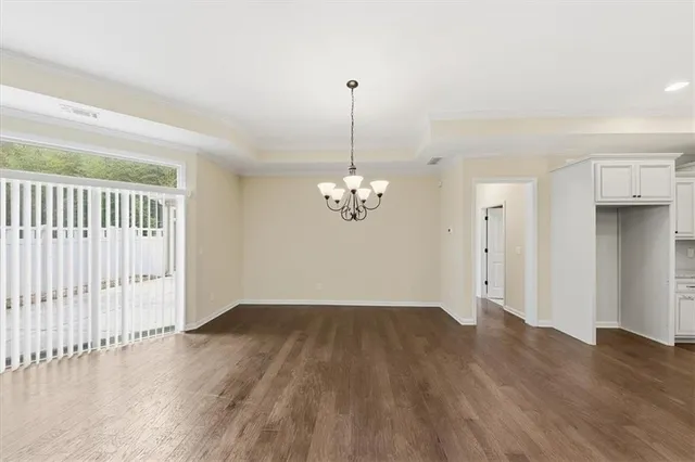 a open kitchen with stainless steel appliances granite countertop a sink a stove and a refrigerator