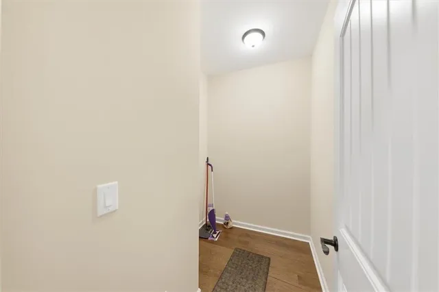 a view of a chandelier fan in a room