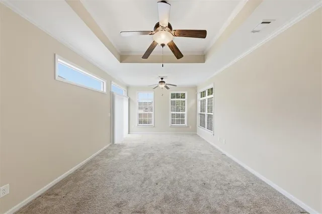 a spacious bathroom with a double vanity sink and a mirror