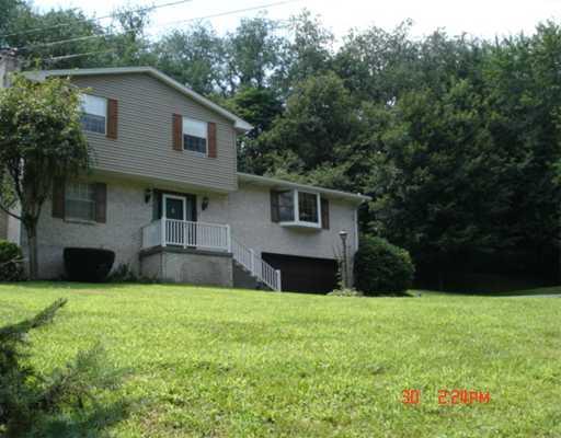 440 Meadow Spring Road Latrobe, PA 15650 - Photo 18 of 18 Exterior Front. This home offers country living just minutes from everywhere with privacy and tranquality.
